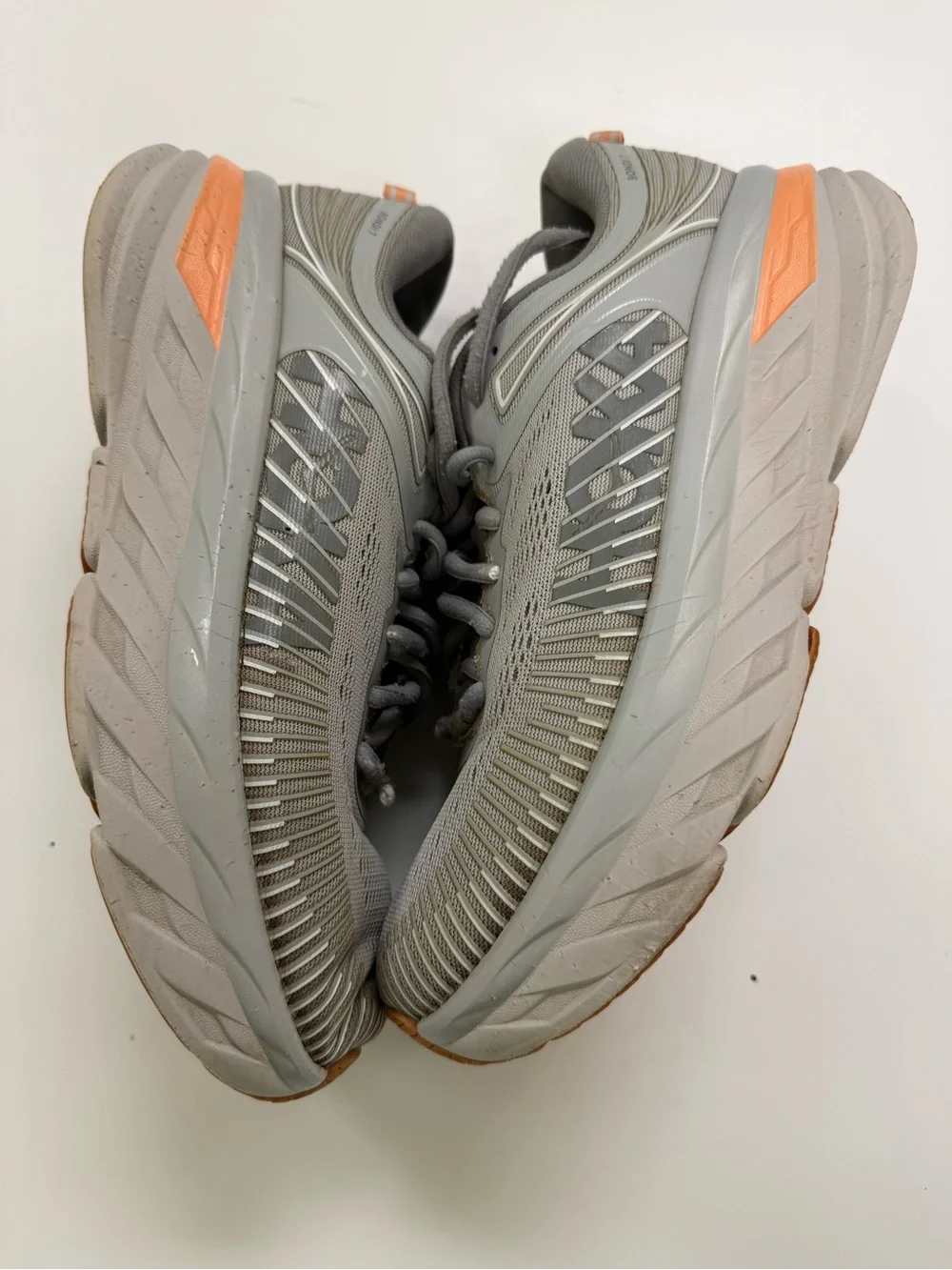 Hoka One One Men's Light Gray Running Shoes with Orange Accents